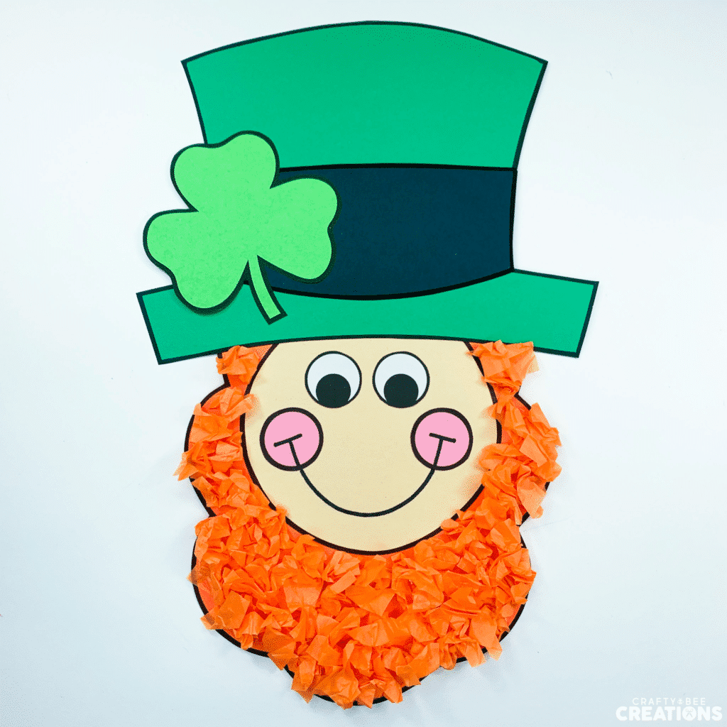 The leprechaun craft is finished with a nice full beard of orange tissue paper.