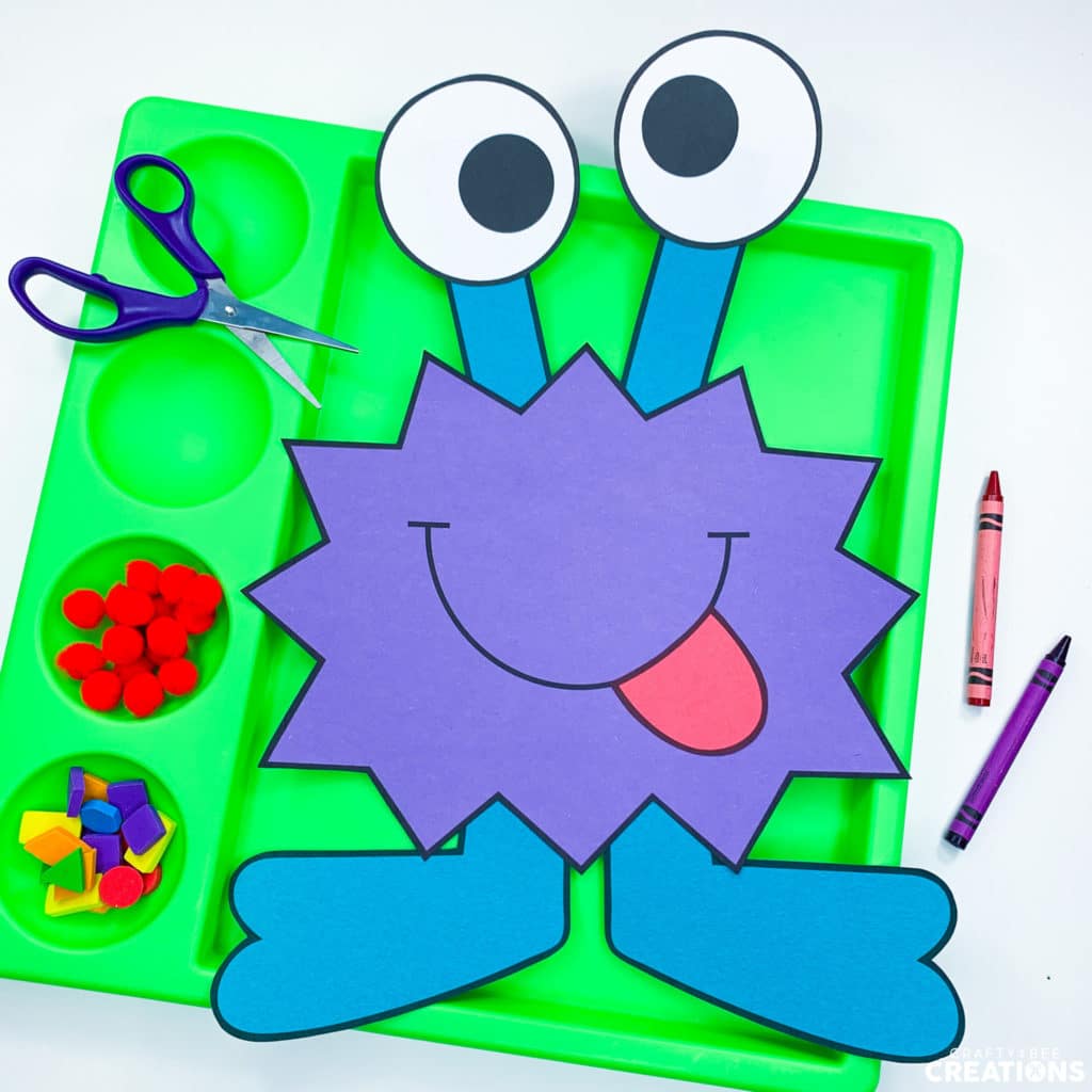 Blue monster craft with two tall eyes and a tongue sticking out.