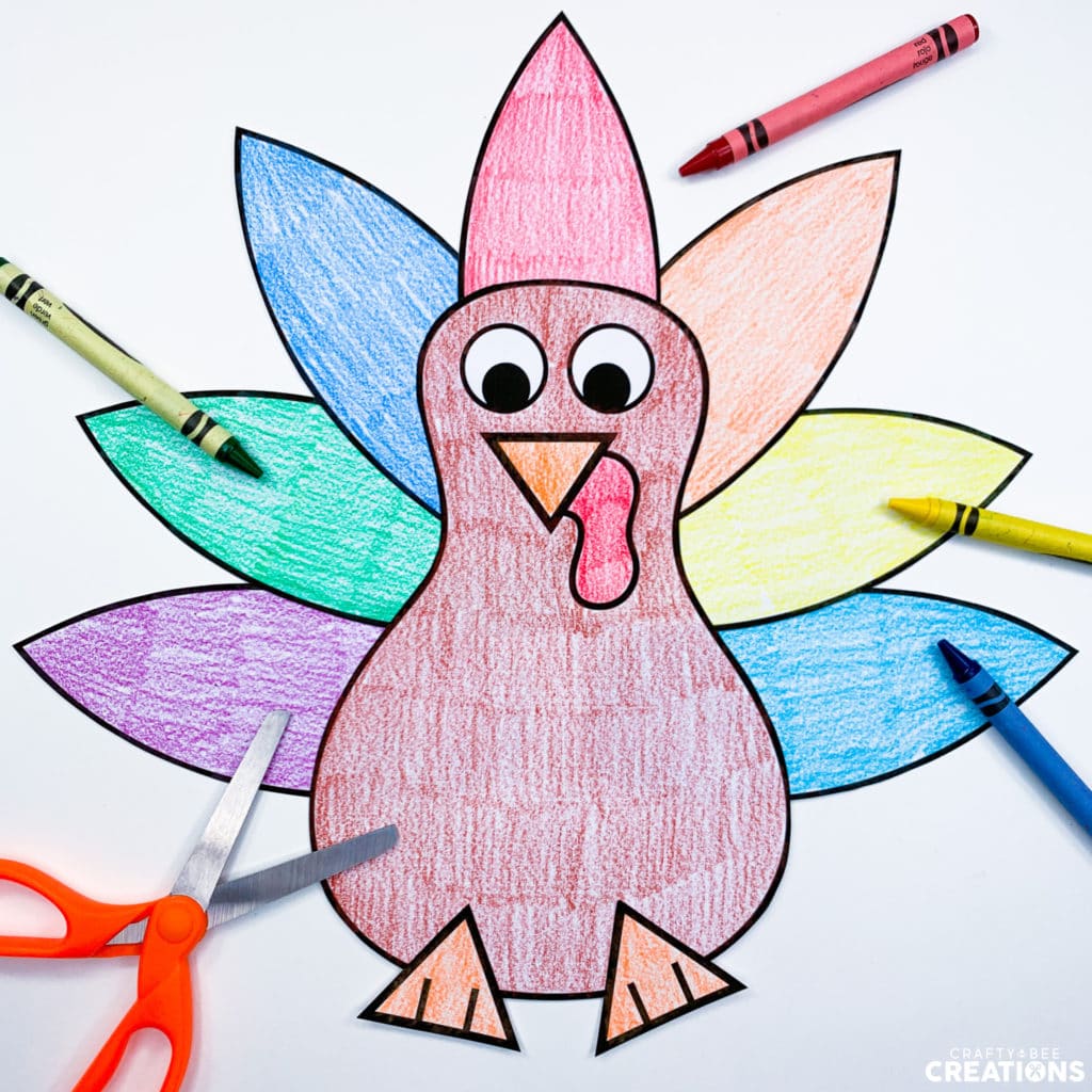 Colorful turkey craft that makes a great Thanksgiving bulletin board display.