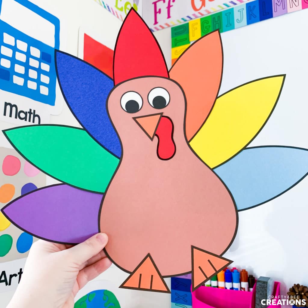 Colorful turkey craft that makes a great Thanksgiving bulletin board display.