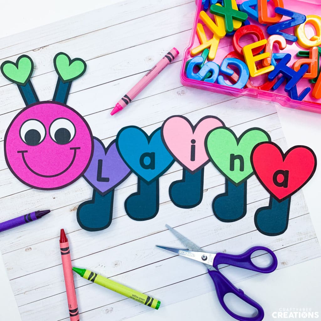 Valentine's Day Craft - Craft is pictured with multiple crayons and colored magnetic letters.