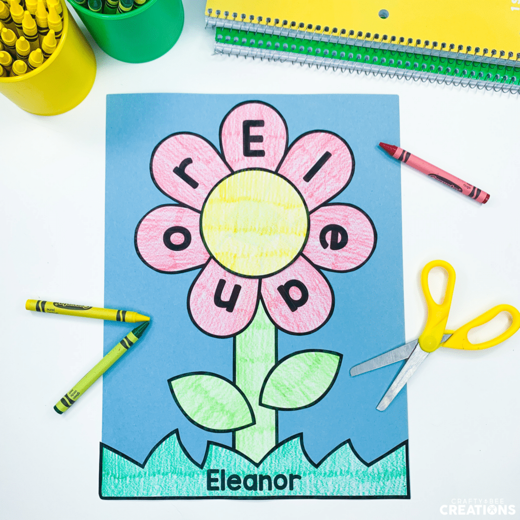 Flower name craft colored in by a child.