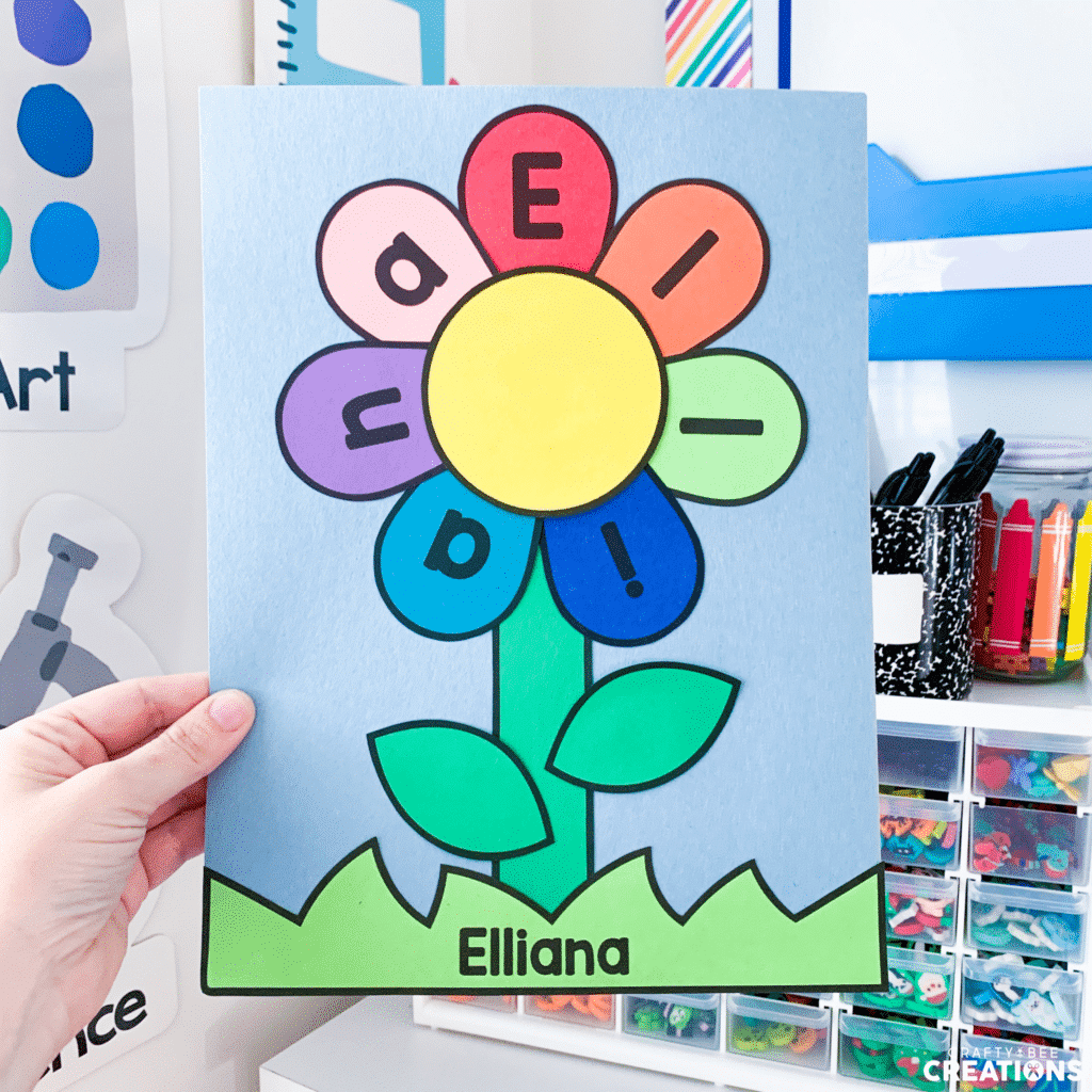 Flower name craft with multicolored petals.