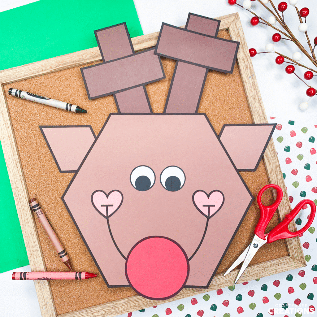 Shape reindeer craft - craft in action with scissors and crayons